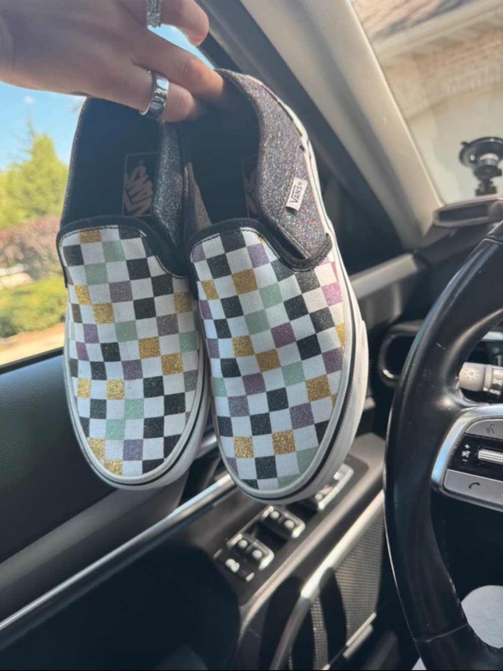 Vans Slip-On Checkerboard Sneakers in Black with Gold, Green and Purple Accents